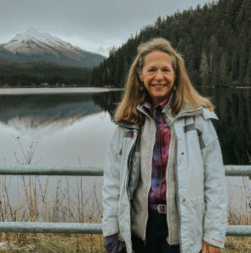 Photo of board member Peggy Cowan on the Auke Lake trail.